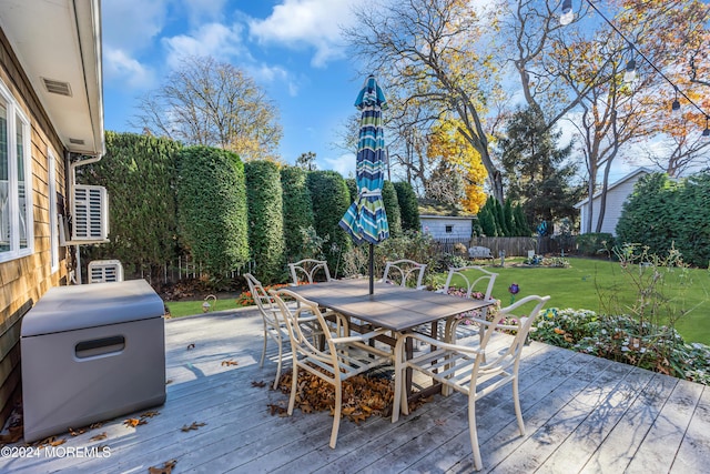 708 New York Blvd, Sea Girt, NJ 08750 - wooden terrace with outdoor dining area and a fenced backyard