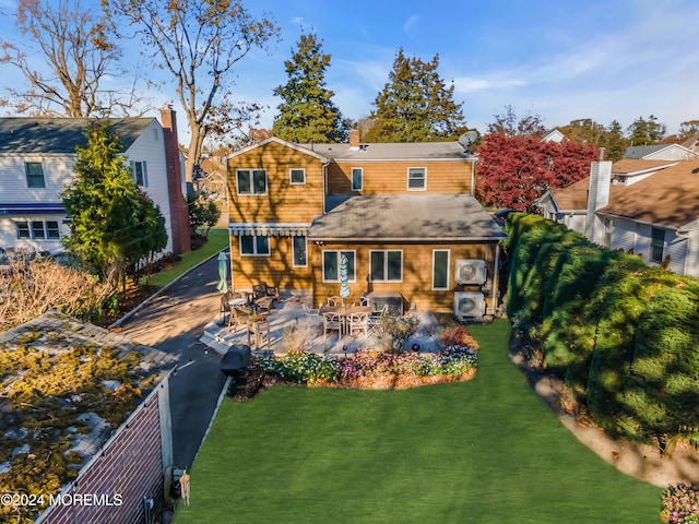 708 New York Blvd, Sea Girt, NJ 08750 - rear view of property with outdoor dining space, a chimney, roof with shingles, and a patio