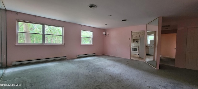 16 Ivy Ct Unit A, Whiting, NJ 08759 - carpeted empty room with a baseboard radiator and a chandelier