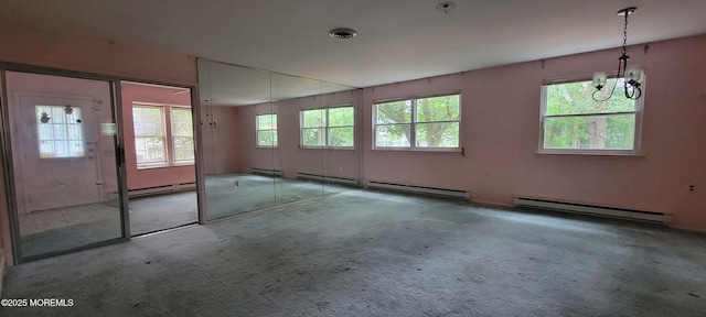 16 Ivy Ct Unit A, Whiting, NJ 08759 - carpeted empty room featuring a baseboard radiator and a chandelier