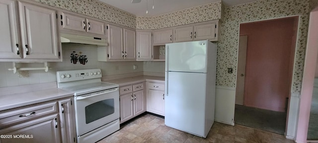 16 Ivy Ct Unit A, Whiting, NJ 08759 - kitchen with white appliances, light countertops, under cabinet range hood, backsplash, and wallpapered walls