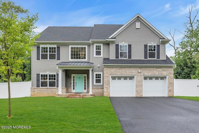 10 Willow Ave, Matawan, NJ 07747 - view of front of property with driveway, an attached garage, a shingled roof, and brick siding