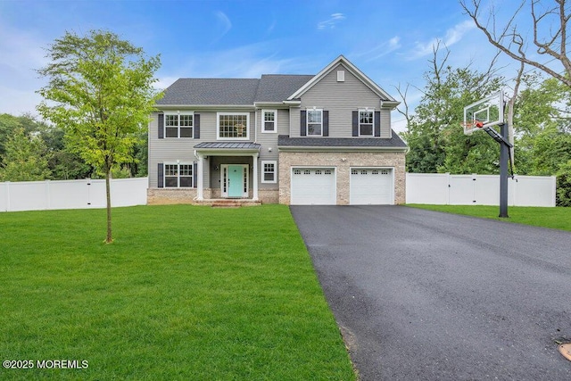 10 Willow Ave, Matawan, NJ 07747 - view of front facade featuring driveway and a garage