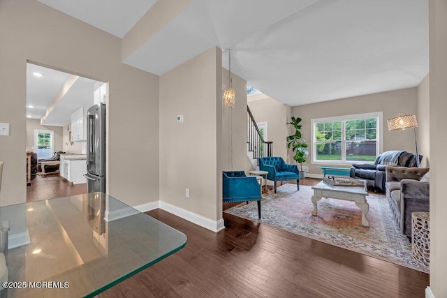 10 Willow Ave, Matawan, NJ 07747 - living room featuring dark wood finished floors, stairway, a chandelier, vaulted ceiling, and recessed lighting