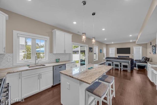 10 Willow Ave, Matawan, NJ 07747 - kitchen with appliances with stainless steel finishes, healthy amount of natural light, open floor plan, decorative backsplash, and recessed lighting