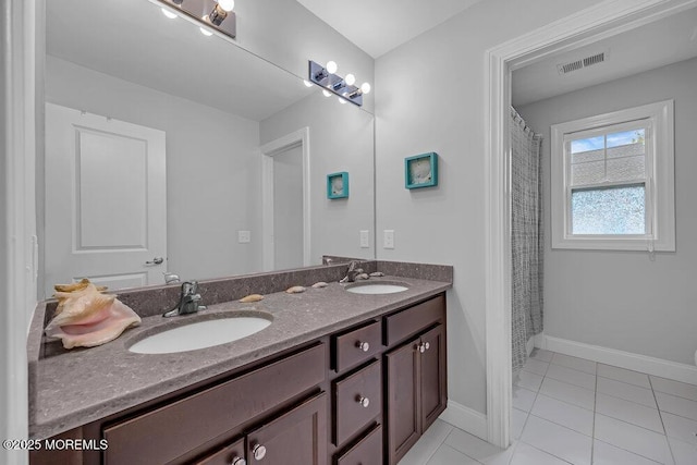 10 Willow Ave, Matawan, NJ 07747 - full bath with double vanity and tile patterned flooring
