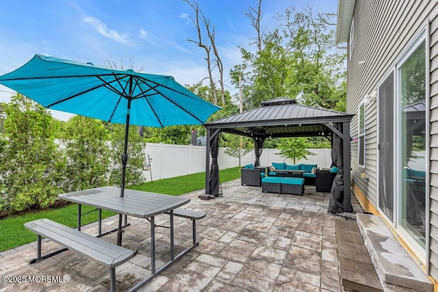 10 Willow Ave, Matawan, NJ 07747 - fenced backyard with an outdoor living space, a patio area, a gazebo, and outdoor dining area