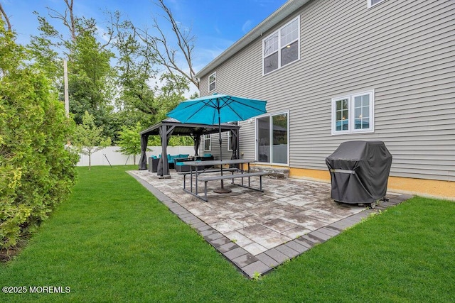 10 Willow Ave, Matawan, NJ 07747 - fenced backyard with area for grilling, a patio area, and a gazebo
