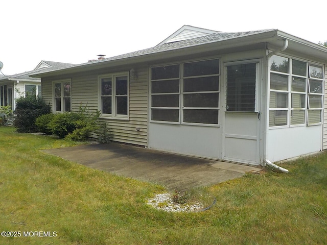 17 Meadowbrook Rd, Brick, NJ 08723 - view of side of property featuring a lawn, roof with shingles, and a patio area