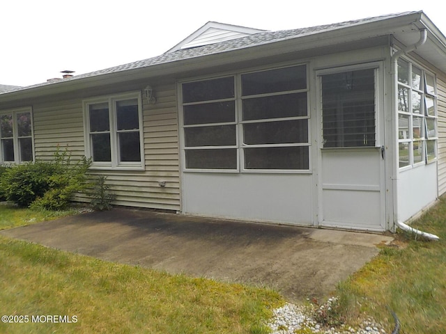 17 Meadowbrook Rd, Brick, NJ 08723 - view of side of home featuring roof with shingles