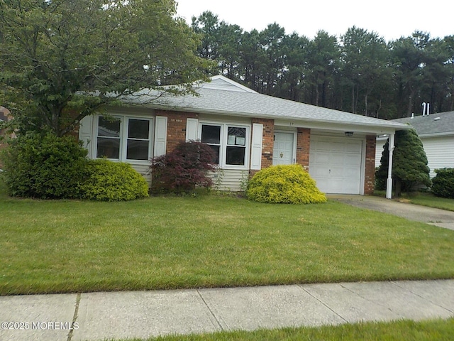 17 Meadowbrook Rd, Brick, NJ 08723 - view of front of home with a garage, concrete driveway, a front yard, and brick siding