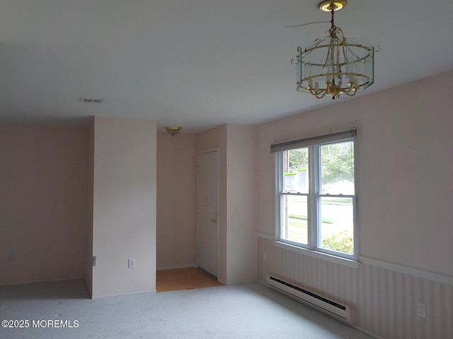17 Meadowbrook Rd, Brick, NJ 08723 - unfurnished room featuring a baseboard heating unit, a chandelier, carpet flooring, and wainscoting