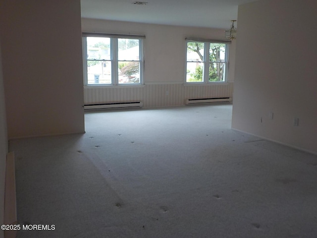 17 Meadowbrook Rd, Brick, NJ 08723 - unfurnished room featuring a baseboard heating unit, carpet, and a chandelier