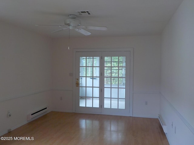 17 Meadowbrook Rd, Brick, NJ 08723 - spare room with baseboard heating, light wood-style floors, and a ceiling fan