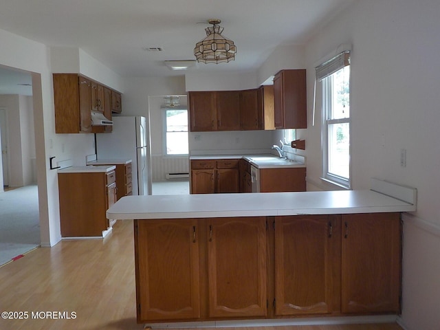 17 Meadowbrook Rd, Brick, NJ 08723 - kitchen featuring extractor fan, a baseboard radiator, a peninsula, and healthy amount of natural light