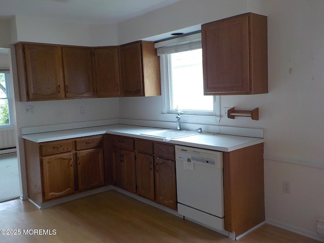 17 Meadowbrook Rd, Brick, NJ 08723 - kitchen with dishwasher, light countertops, light wood finished floors, and brown cabinets