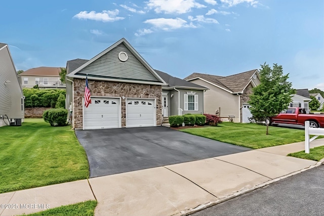 114 Maypink Ln, Howell, NJ 07731 - single story home with asphalt driveway, stone siding, a garage, and a front yard