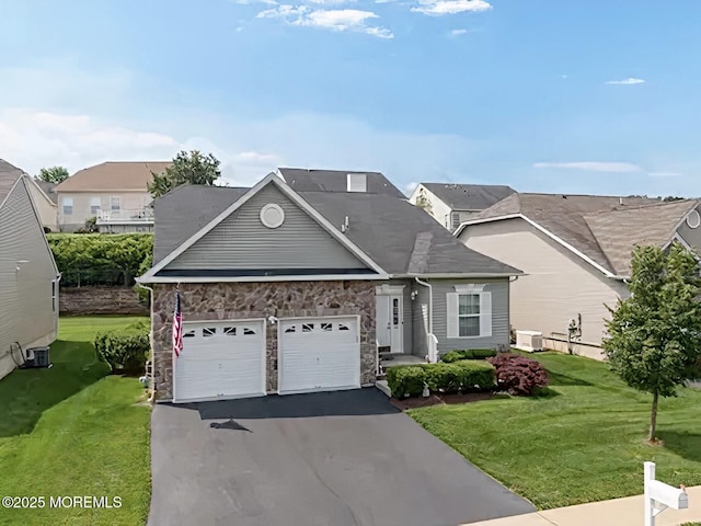 114 Maypink Ln, Howell, NJ 07731 - view of front of property with a garage, driveway, stone siding, and a front yard
