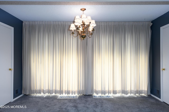 60 Beaumont Ct, Tinton Falls, NJ 07724 - spare room with carpet flooring and a chandelier