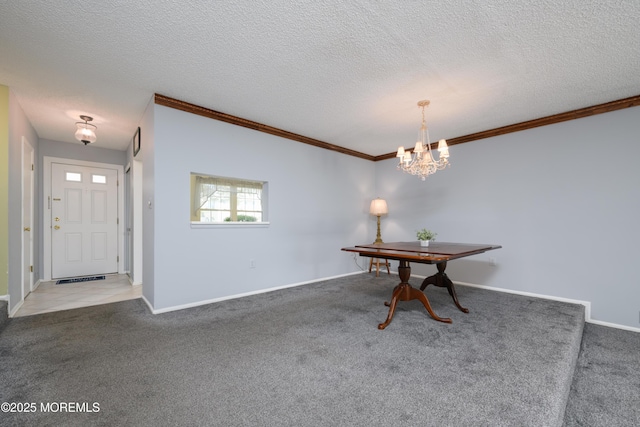 60 Beaumont Ct, Tinton Falls, NJ 07724 - carpeted dining space with ornamental molding, a chandelier, and a textured ceiling