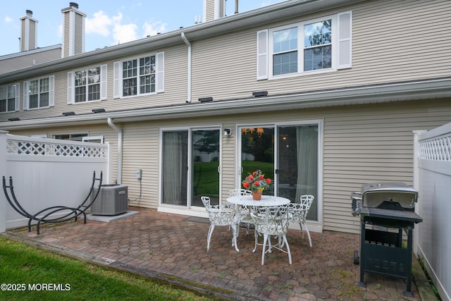 60 Beaumont Ct, Tinton Falls, NJ 07724 - rear view of property with a patio and a chimney