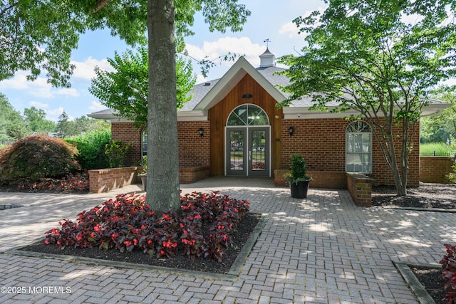 60 Beaumont Ct, Tinton Falls, NJ 07724 - view of front of home with brick siding and french doors