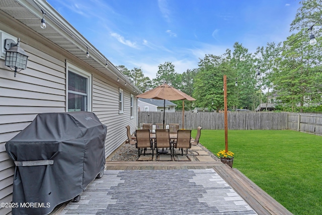 217 Hemlock Dr, Lanoka Harbor, NJ 08734 - wooden deck with grilling area, a fenced backyard, and outdoor dining area