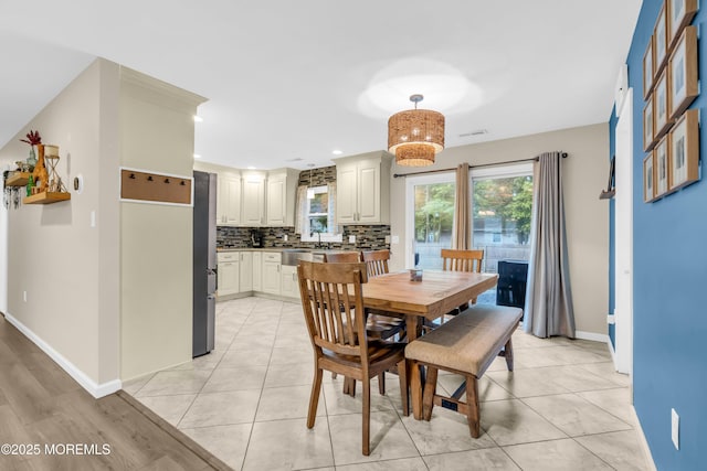 217 Hemlock Dr, Lanoka Harbor, NJ 08734 - dining room featuring plenty of natural light, recessed lighting, and light tile patterned floors