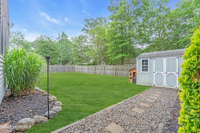 217 Hemlock Dr, Lanoka Harbor, NJ 08734 - fenced backyard featuring a storage unit