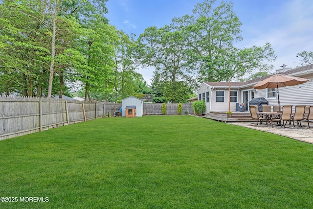 217 Hemlock Dr, Lanoka Harbor, NJ 08734 - fenced backyard featuring a storage shed and a deck