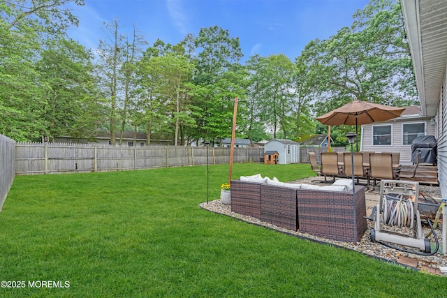 217 Hemlock Dr, Lanoka Harbor, NJ 08734 - fenced backyard featuring a storage shed and an outdoor living space