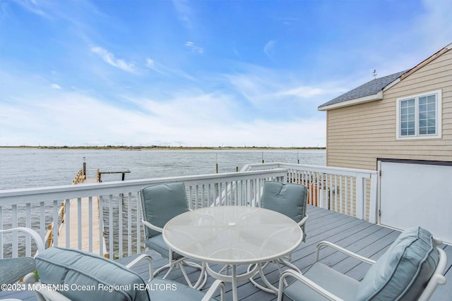 681/2 Shrewsbury Ave, Highlands, NJ 07732 - wooden deck with a water view and outdoor dining space