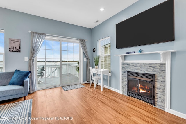 681/2 Shrewsbury Ave, Highlands, NJ 07732 - living area with a fireplace, wood finished floors, and recessed lighting