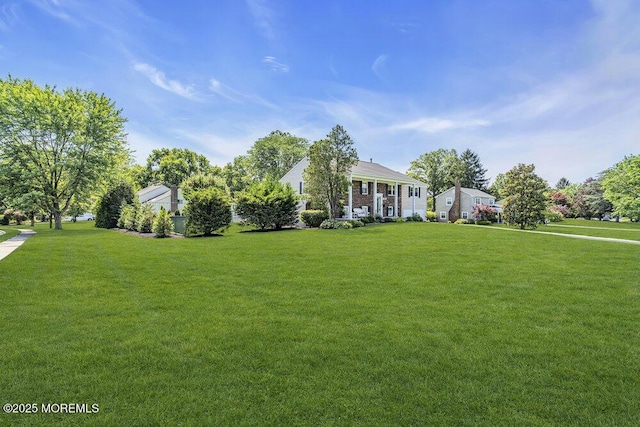 22 Indian Hill Rd, Freehold, NJ 07728 - view of front of house with a front lawn