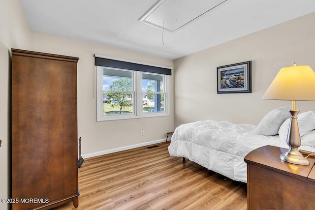 22 Indian Hill Rd, Freehold, NJ 07728 - bedroom featuring attic access and light wood-style flooring