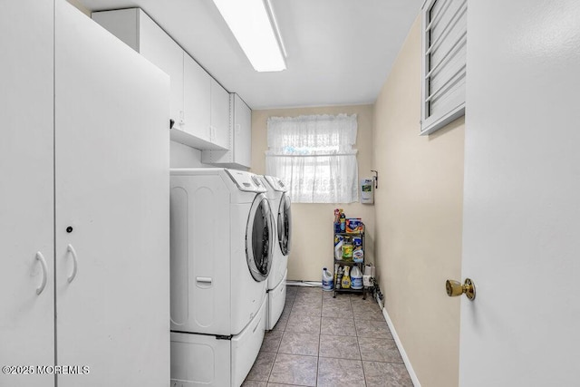 22 Indian Hill Rd, Freehold, NJ 07728 - laundry area featuring washer and dryer, cabinet space, and light tile patterned flooring