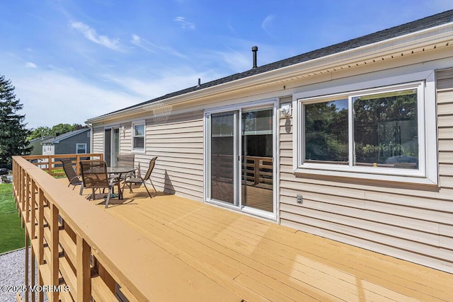 22 Indian Hill Rd, Freehold, NJ 07728 - wooden terrace featuring outdoor dining area