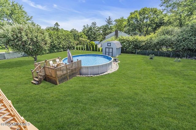 22 Indian Hill Rd, Freehold, NJ 07728 - fenced backyard with a shed, a deck, and an outdoor pool