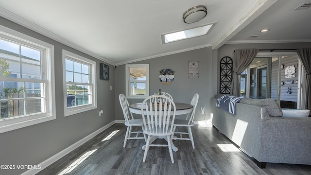 14 S Portland Dr, Little Egg Harbor, NJ 08087 - dining room featuring a skylight, lofted ceiling, wood finished floors, and crown molding