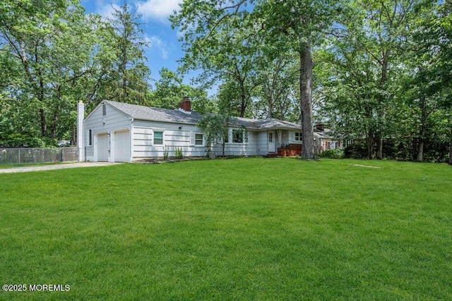 424 Colleen Ct, Toms River, NJ 08755 - ranch-style home with a chimney, a garage, and driveway