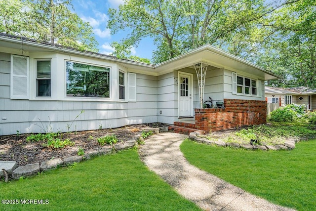 424 Colleen Ct, Toms River, NJ 08755 - single story home with a front yard and brick siding