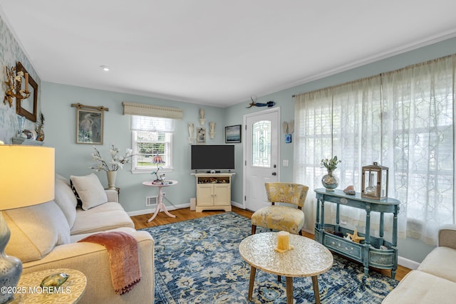 553 Kingfisher Cir, Brick, NJ 08723 - living area featuring plenty of natural light and wood finished floors