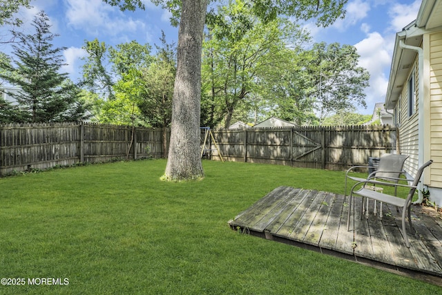 553 Kingfisher Cir, Brick, NJ 08723 - fenced backyard featuring a wooden deck