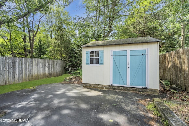 553 Kingfisher Cir, Brick, NJ 08723 - view of shed featuring a fenced backyard