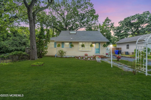 553 Kingfisher Cir, Brick, NJ 08723 - back of property featuring roof with shingles and a chimney