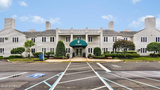 164 Cours De Clemenceau Unit E, Freehold, NJ 07728 - view of property with uncovered parking
