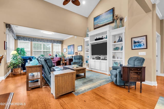 7 Bay Head Ct, Waretown, NJ 08758 - living area with high vaulted ceiling, light wood-style floors, ceiling fan, and crown molding