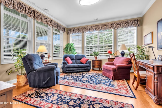 7 Bay Head Ct, Waretown, NJ 08758 - sunroom with crown molding, healthy amount of natural light, and hardwood / wood-style flooring