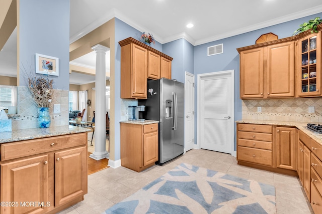 7 Bay Head Ct, Waretown, NJ 08758 - kitchen featuring stainless steel appliances, decorative columns, crown molding, decorative backsplash, and glass insert cabinets