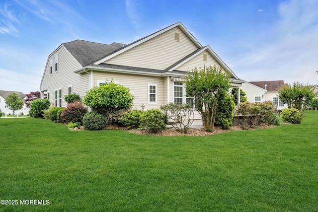 7 Bay Head Ct, Waretown, NJ 08758 - view of property exterior with a yard and roof with shingles